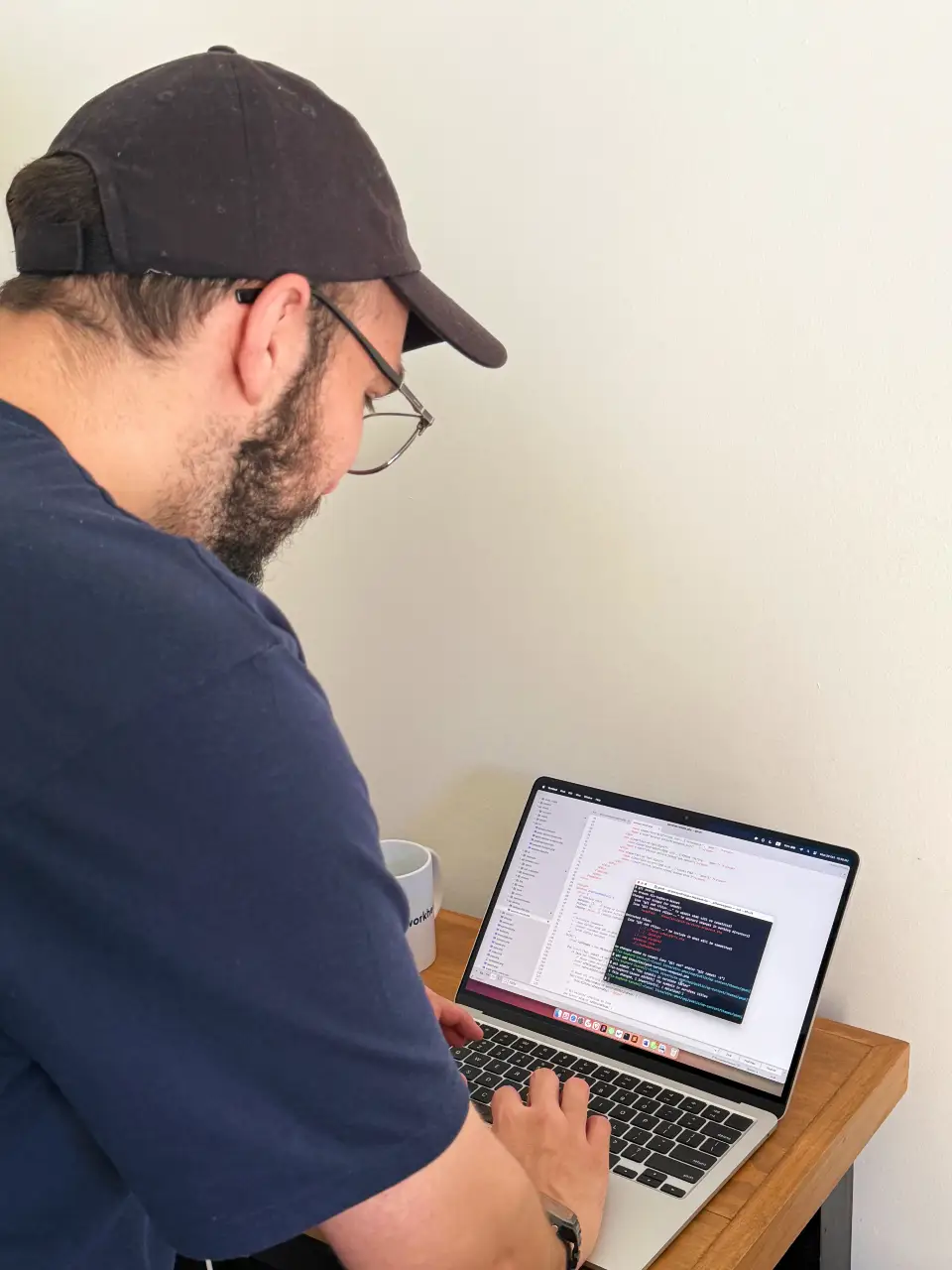 Jorge Araya working on code Jorge Araya working on code
